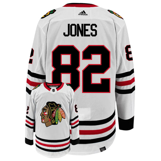 Hockey Caleb Jones Chicago Blackhawks 82 Jersey